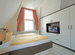 Schlafzimmer mit Doppelbett